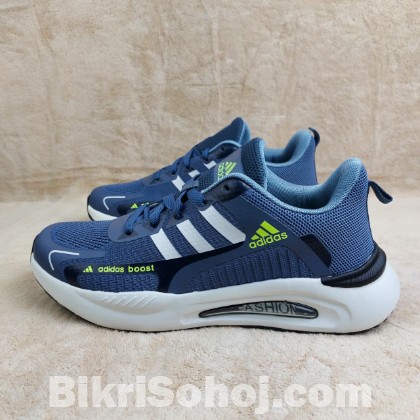 adidas Boost running shoes in a blue colorway with white